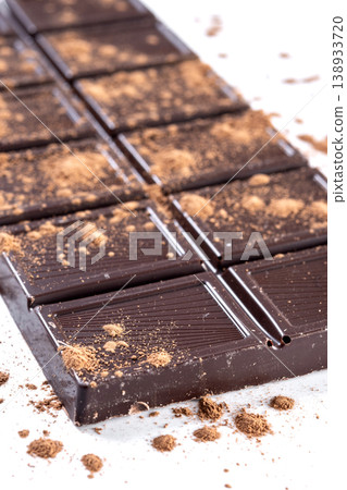 Milk chocolate bar with cocoa powder Milk chocolate bar with cocoa powder 138933720