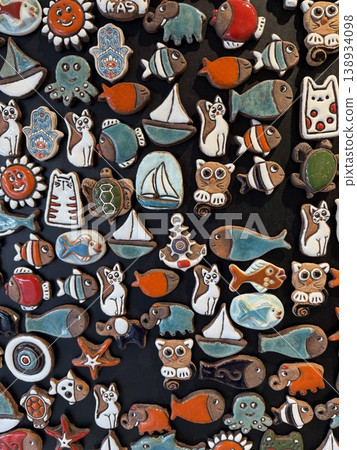 Colorful nautical-themed cookies with assorted shapes and designs on a dark background Colorful nautical-themed cookies with assorted shapes and designs on a dark background 138934098