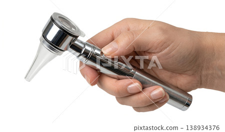Hand holding a diagnostic otoscope with a disposable speculum and battery handle, isolated on transparent background, representing ear examination and ENT practice Hand holding a diagnostic otoscope with a disposable speculum and battery handle, isolated on transparent background, representing ear examination and ENT practice 138934376