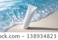 White skincare tubes standing on a sandy beach – summer product materials, easy to use in beauty advertisements promoting UV protection and moisturizing. 138934823