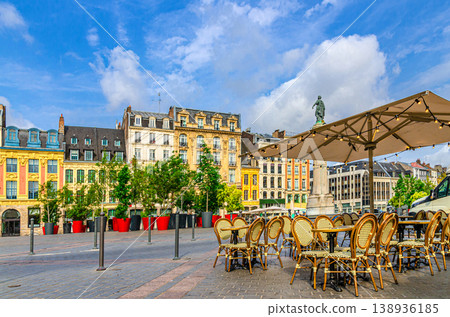 Street restaurant tables and chairs on La Grand Place square in Lille city center Street restaurant tables and chairs on La Grand Place square in Lille city center 138936185
