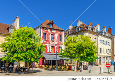 Street restaurant, cafe with tables and chairs and old typical houses colorful buildings in Dijon city Street restaurant, cafe with tables and chairs and old typical houses colorful buildings in Dijon city 138936196