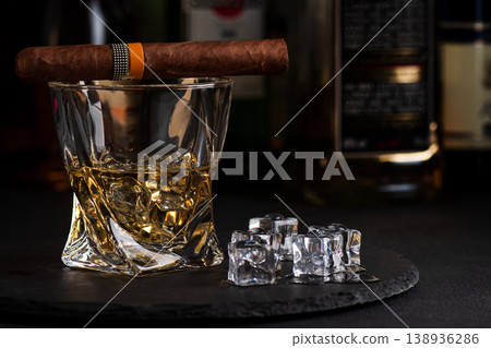Whiskey Glass with Cigar. Luxurious Bar Ambience Whiskey Glass with Cigar. Luxurious Bar Ambience 138936286