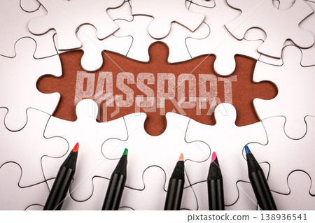 Passport Word on Puzzle Piece Surrounded by Jigsaw Background 138936541
