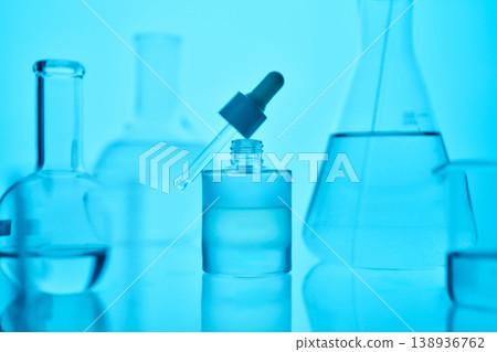 Skincare serum bottle and dropper in laboratory background Skincare serum bottle and dropper in laboratory background 138936762