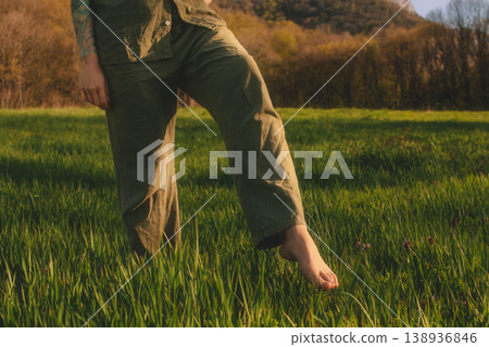 Barefoot Grounding in Green Grass at Golden Hour Barefoot Grounding in Green Grass at Golden Hour 138936846