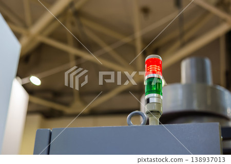 Close up of alarm lamp signal warning flashing light for industrial machinery Close up of alarm lamp signal warning flashing light for industrial machinery 138937013