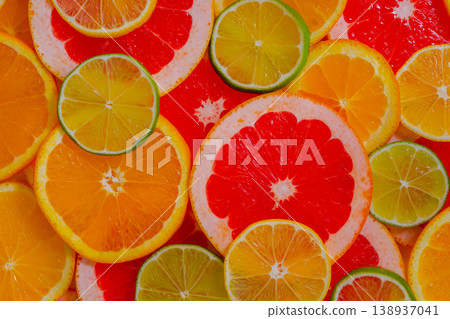 Citrus fruits slices - orange, grapefruit, lemon and lime - top view Citrus fruits slices - orange, grapefruit, lemon and lime - top view 138937041