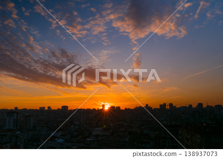 Dramatic sunset sky with the setting sun over the city, Istanbul Dramatic sunset sky with the setting sun over the city, Istanbul 138937073