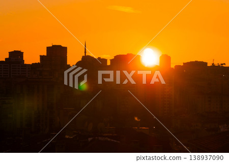 Dramatic sunset sky with the setting sun over the city, Istanbul, Turkey Dramatic sunset sky with the setting sun over the city, Istanbul, Turkey 138937090