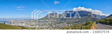 City landscape near mountains with a cloudy blue sky background on a sunny summer day. Beautiful cityscape of Cape Town, South Africa as a travel vacation or holiday destination in a coastal location City landscape near mountains with a cloudy blue sky background on a sunny summer day. Beautiful cityscape of Cape Town, South Africa as a travel vacation or holiday destination in a coastal location 138937574