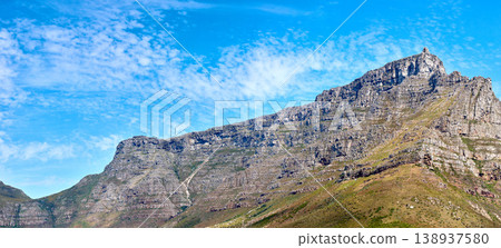 Landscape of Table mountain, Cape Town, South Africa with copyspace. Panoramic view of rocky terrain with bright blue sky in the background during summer. Scenic view of Africas tourist destination Landscape of Table mountain, Cape Town, South Africa with copyspace. Panoramic view of rocky terrain with bright blue sky in the background during summer. Scenic view of Africas tourist destination 138937580
