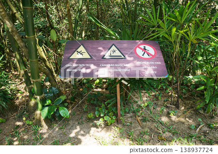 A big desk with signs of slippery, deep water and no entry in safari park A big desk with signs of slippery, deep water and no entry in safari park 138937724
