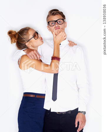 Portrait, couple in glasses and sad face in studio isolated on white background. Man, woman in eyewear and facial expression of funny people in love, playful or cool style for trendy fashion together Portrait, couple in glasses and sad face in studio isolated on white background. Man, woman in eyewear and facial expression of funny people in love, playful or cool style for trendy fashion together 138938036