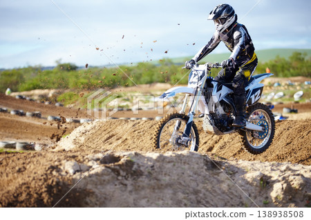 Man, motorcycle or off road race track jump as professional person in action danger, competition or fearless. Bike rider, transportation or fast speed adventure or rally, extreme sport or challenge Man, motorcycle or off road race track jump as professional person in action danger, competition or fearless. Bike rider, transportation or fast speed adventure or rally, extreme sport or challenge 138938508