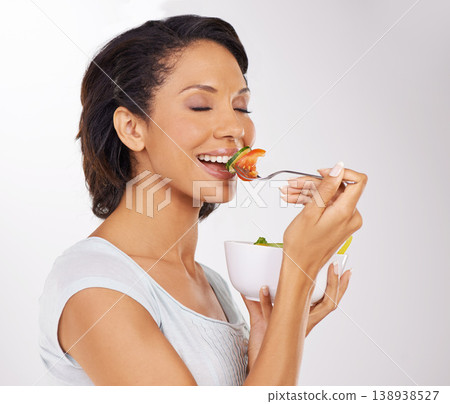 Happy woman, salad bowl and diet with fruit for natural nutrition against a studio background. Face of female person or model smile with organic food, fiber or vitamins for healthy meal and wellness 138938527