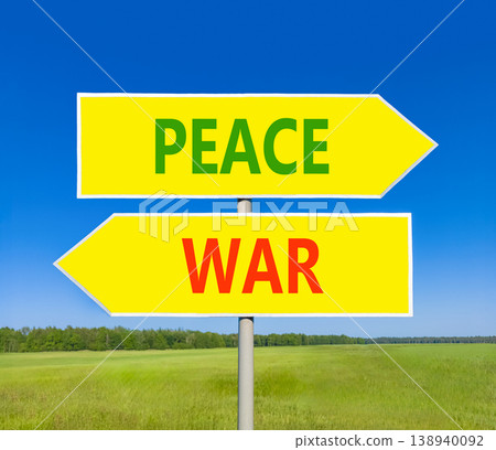 Peace instead war symbol. Concept words Peace and War on beautiful yellow road sign. Beautiful blue sky green grass background. Social and peace instead war concept. Copy space. Peace instead war symbol. Concept words Peace and War on beautiful yellow road sign. Beautiful blue sky green grass background. Social and peace instead war concept. Copy space. 138940092