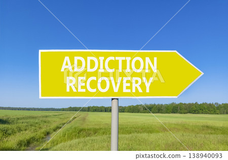 Addiction recovery symbol. Concept words Addiction recovery on beautiful yellow road sign. Beautiful blue sky green grass field background. Psychology addiction recovery concept. Copy space. Addiction recovery symbol. Concept words Addiction recovery on beautiful yellow road sign. Beautiful blue sky green grass field background. Psychology addiction recovery concept. Copy space. 138940093
