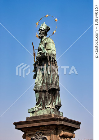 Patron Saint Nepomuk sculpture on the Charles Bridge in the city of Prague, Czech Republic Patron Saint Nepomuk sculpture on the Charles Bridge in the city of Prague, Czech Republic 138940157