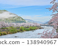 A clear morning after the rain, a photograph of cherry blossoms and snow-capped mountains shrouded in mist. [Gujō City, Gifu Prefecture] 138940967