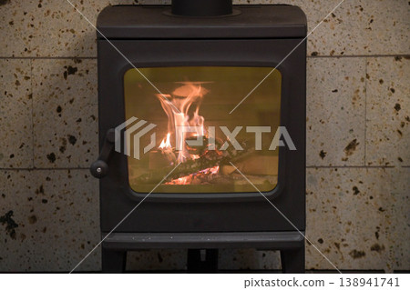 Flame of wood stove Flame of wood stove 138941741