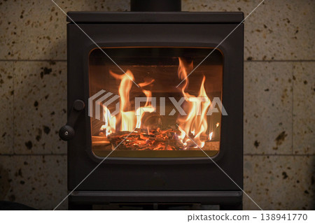 Flame of wood stove 138941770