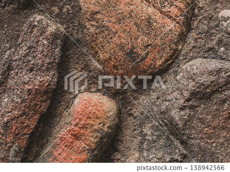 Large stones background old coarse cobblestones texture concrete surface brown solid structure rough, close-up 138942566