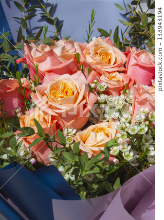 This is a bouquet with pink roses. 138943194