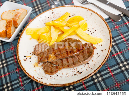 Beef and potato with serving pieces Beef and potato with serving pieces 138943365