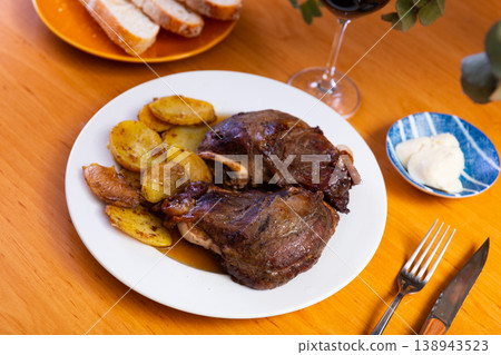 Nice dish of pork roast served with potatoes on side 138943523