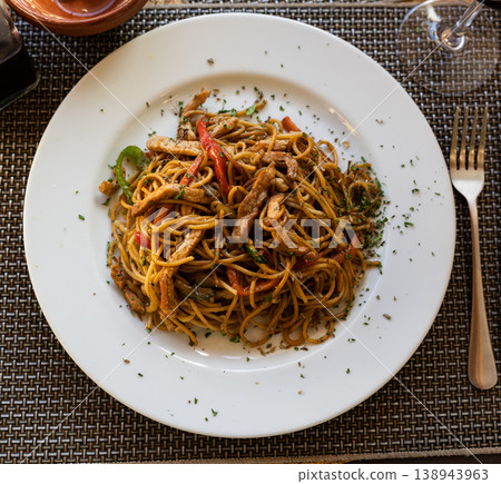 Chinese fried beef noodles served on platter Chinese fried beef noodles served on platter 138943963