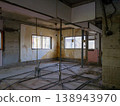 Demolition site in a skeleton state; Interior of a house after demolition during apartment complex renovation. 138943970