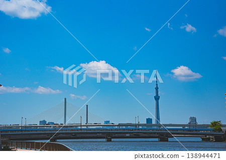 A view of the Nakagawa River in Katsushika, Tokyo, under the clear blue sky of early summer. A view of the Nakagawa River in Katsushika, Tokyo, under the clear blue sky of early summer. 138944471
