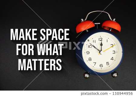 Make Space For What Matters text with alarm clock on black background Make Space For What Matters text with alarm clock on black background 138944956