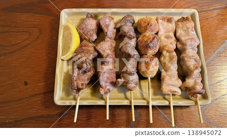 A delicious-looking assortment of grilled chicken skewers (Izakaya menu) A delicious-looking assortment of grilled chicken skewers (Izakaya menu) 138945072