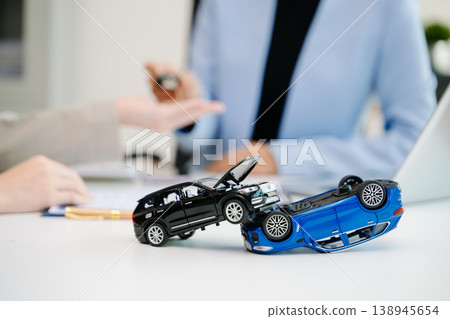 Car accident concept showing vehicle collision and damage. Symbol of insurance claim, auto insurance, risk, financial loss, accident assessment 138945654