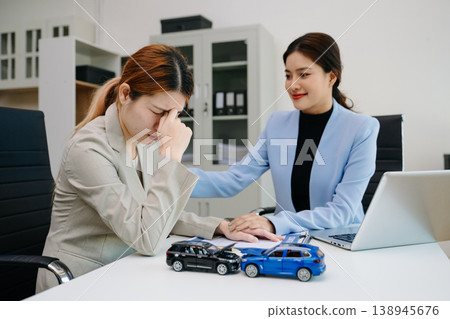 Insurance advisor comforting stressed customer during car accident claim consultation. Emotional support, financial assistance 138945676