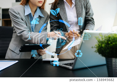 Business team working virtual modern smartphone to reduce CO2 emissions carbon footprint climate change to limit global warming.Sustainable development and green business concep Business team working virtual modern smartphone to reduce CO2 emissions carbon footprint climate change to limit global warming.Sustainable development and green business concep 138945682