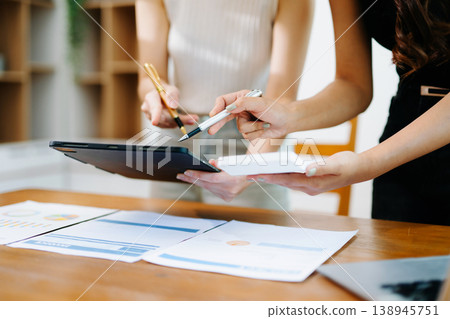 Team business meeting presentation. Hand businessman working project in modern office.Laptop computer and tablet and smart phone 138945751