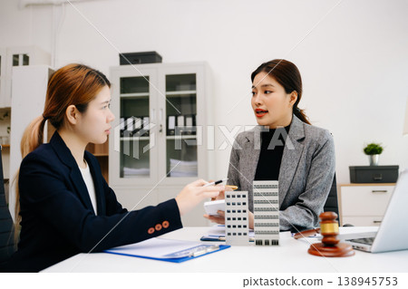 Professional business meeting with real estate models, legal consulting, contract discussion and corporate negotiation for investment and property management Professional business meeting with real estate models, legal consulting, contract discussion and corporate negotiation for investment and property management 138945753