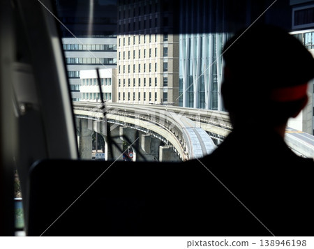 Monorail driver and the curved track of the monorail as seen from the driver's seat | Blog, Education, Transportation Infrastructure Materials, Tourism PR 138946198