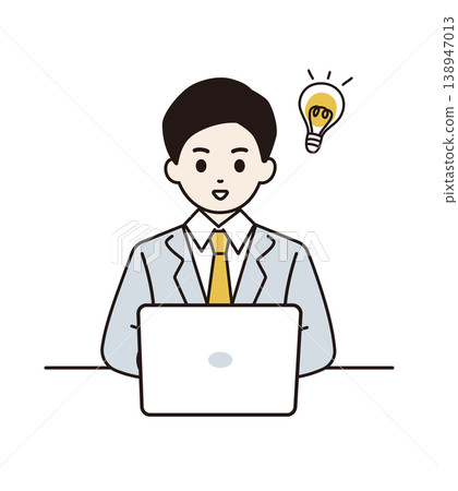 A businessman who has an idea while working on his computer 138947013