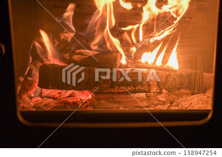 Flame of wood stove Flame of wood stove 138947254
