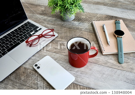 Working from home: A comfortable desk environment with all the necessary gadgets. Working from home: A comfortable desk environment with all the necessary gadgets. 138948004