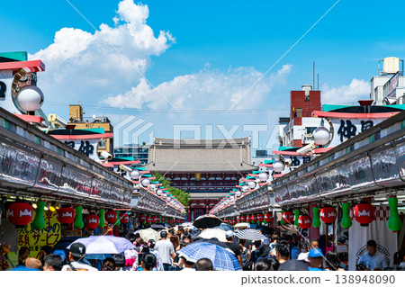[Tokyo] Nakamise Shopping Street at Senso-ji Temple, bustling with tourists. 138948090