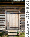 Wooden Plank Door in Rural Log House 138948101