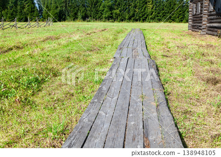 Old Wooden Plank Walkway in Village, Close-Up 138948105
