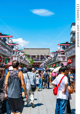[Tokyo] Nakamise Shopping Street at Senso-ji Temple, bustling with tourists. 138948111