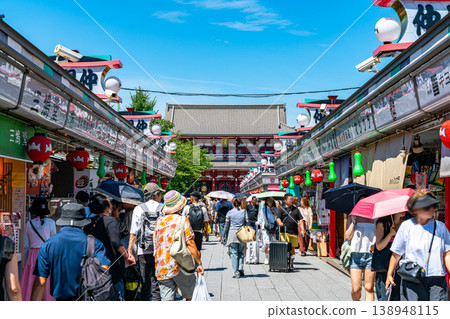 [Tokyo] Nakamise Shopping Street at Senso-ji Temple, bustling with tourists. 138948115