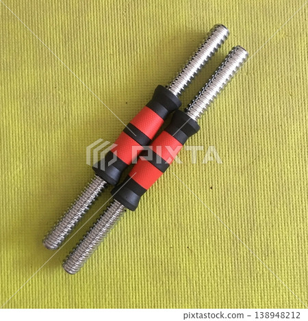 Metal screws with rubber grips positioned on a green background for assembly and construction purposes Metal screws with rubber grips positioned on a green background for assembly and construction purposes 138948212
